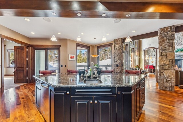 152 County Road 1040, Frisco, CO 80443 - kitchen featuring light wood-style flooring, a center island with sink, plenty of natural light, and a sink