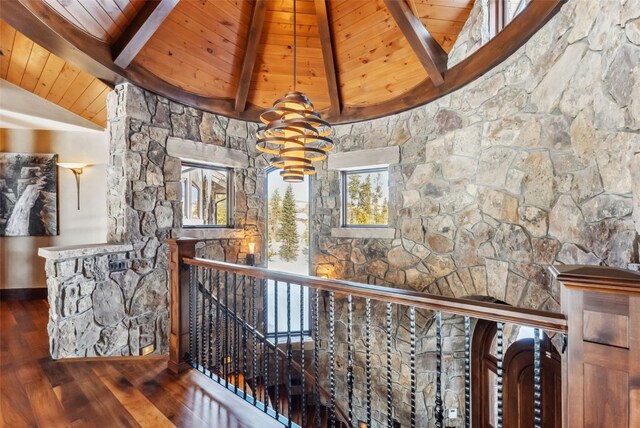152 County Road 1040, Frisco, CO 80443 - hallway featuring hardwood / wood-style floors, wood ceiling, lofted ceiling with beams, and an inviting chandelier