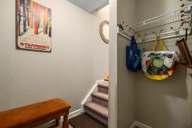 interior space featuring baseboards