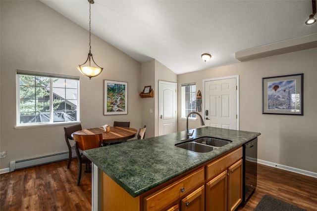 kitchen featuring lofted ceiling, baseboard heating, a sink, and dark wood-style flooring