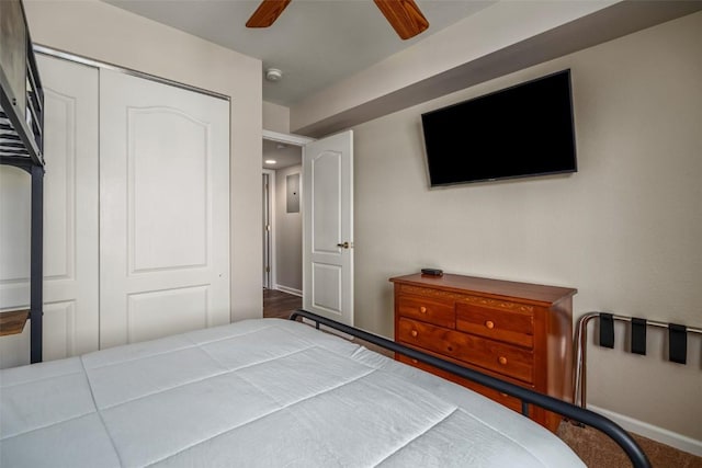 3303 Covey Cir Unit 804, Steamboat Springs, CO 80487 - bedroom featuring a ceiling fan, baseboards, and a closet