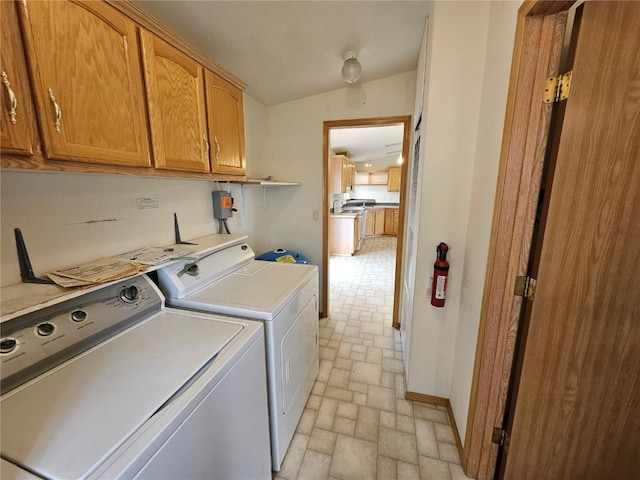 631 Arrowhead Dr, Como, CO 80456 - laundry room with separate washer and dryer, brick patterned flooring, cabinet space, and baseboards