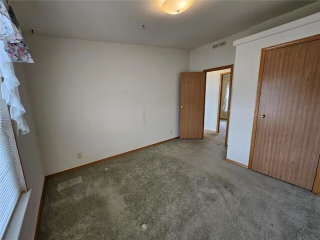 631 Arrowhead Dr, Como, CO 80456 - unfurnished bedroom with carpet and baseboards