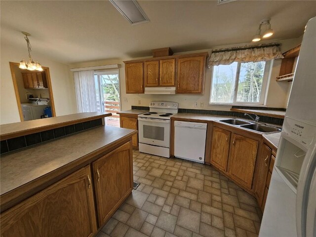 631 Arrowhead Dr, Como, CO 80456 - kitchen with white appliances, under cabinet range hood, a sink, and plenty of natural light