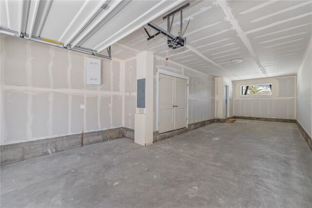 1301 Adams Ave Unit 104, Silverthorne, CO 80498 - garage with electric panel and a garage door opener