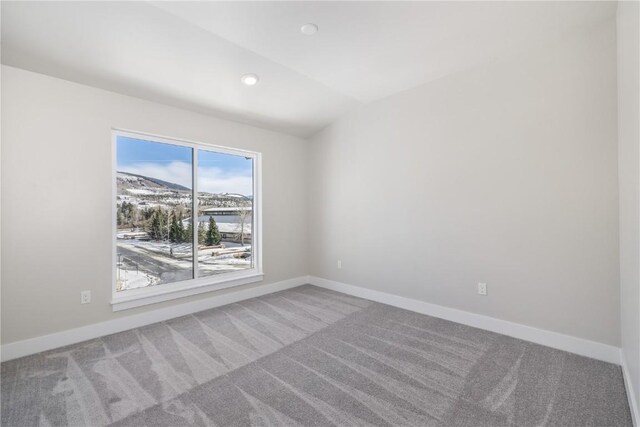 unfurnished room with recessed lighting, carpet floors, and baseboards