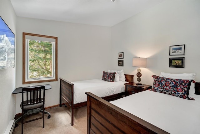 bedroom featuring a baseboard radiator, baseboards, and light colored carpet
