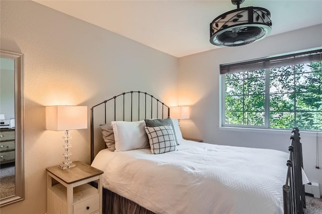 1437 Morgan Ct Unit 1437, Steamboat Springs, CO 80487 - bedroom featuring carpet and a baseboard heating unit