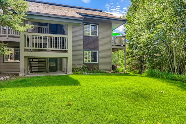 1437 Morgan Ct Unit 1437, Steamboat Springs, CO 80487 - back of property with a lawn