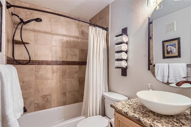 1437 Morgan Ct Unit 1437, Steamboat Springs, CO 80487 - bathroom featuring vanity, shower / bath combo, and a textured wall