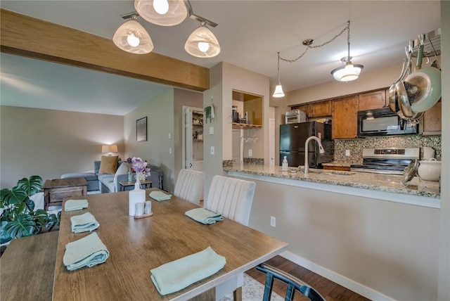 101 Blue Grouse Ln Unit D, Silverthorne, CO 80498 - dining area with wood finished floors