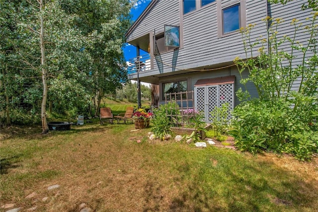 101 Blue Grouse Ln Unit D, Silverthorne, CO 80498 - view of green lawn featuring a balcony