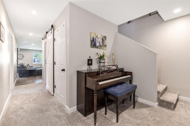 30600 Ormega Way, Oak Creek, CO 80467 - hall featuring carpet, a barn door, stairway, baseboards, and recessed lighting