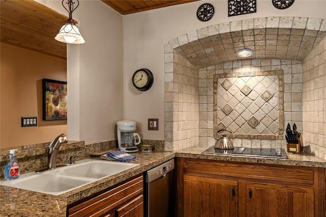 kitchen featuring black electric cooktop, dishwasher, a sink, and hanging light fixtures