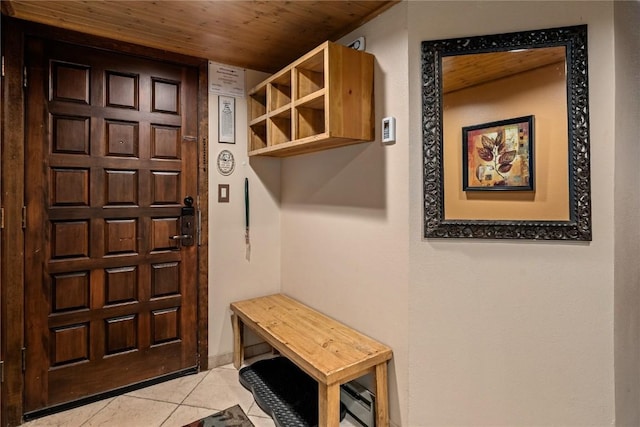 mudroom with wooden ceiling and light tile patterned floors