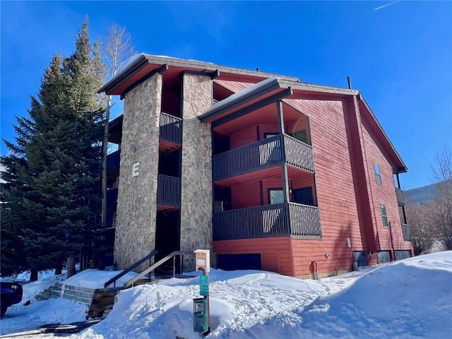 view of snow covered property