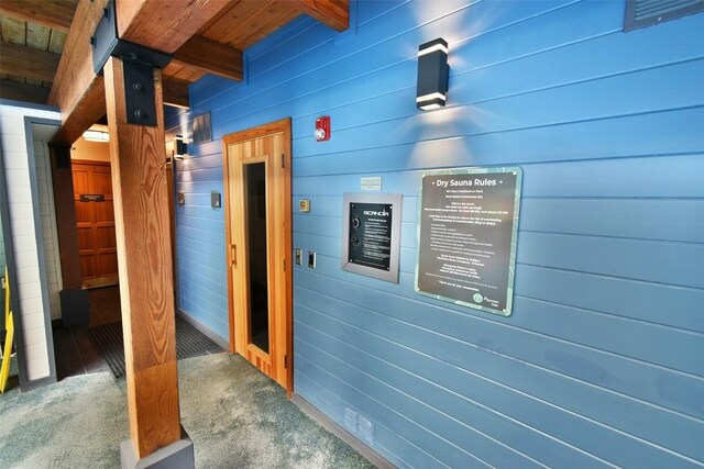 hall featuring visible vents