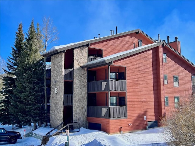 view of snow covered property