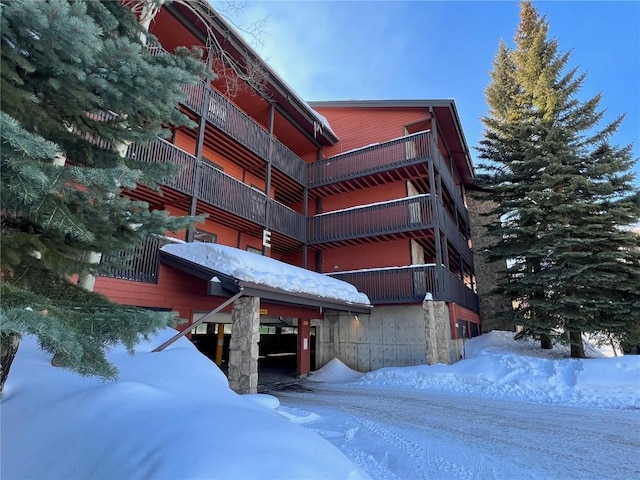 view of snow covered property