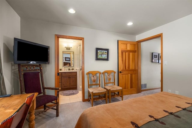 2838 Kitzbuhel Court ., Steamboat Springs, CO 80487 - bedroom featuring light carpet, ensuite bathroom, visible vents, and recessed lighting
