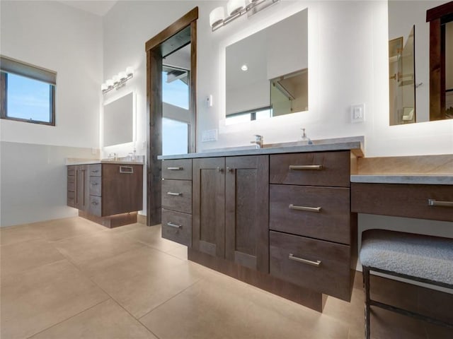 304 Raven Golf Ln, Silverthorne, CO 80498 - bathroom with two vanities and tile patterned floors