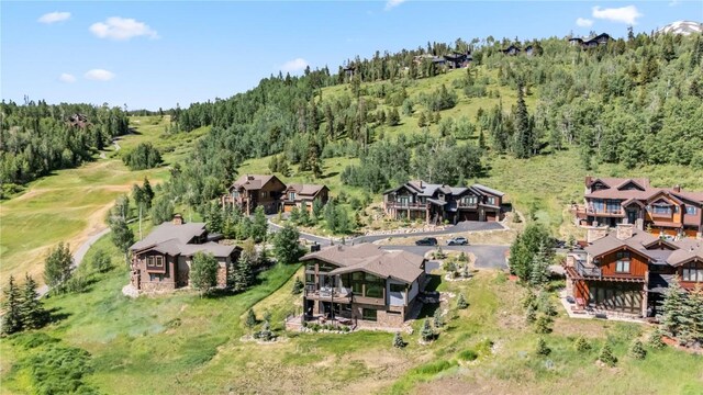 304 Raven Golf Ln, Silverthorne, CO 80498 - aerial perspective of suburban area with a heavily wooded area