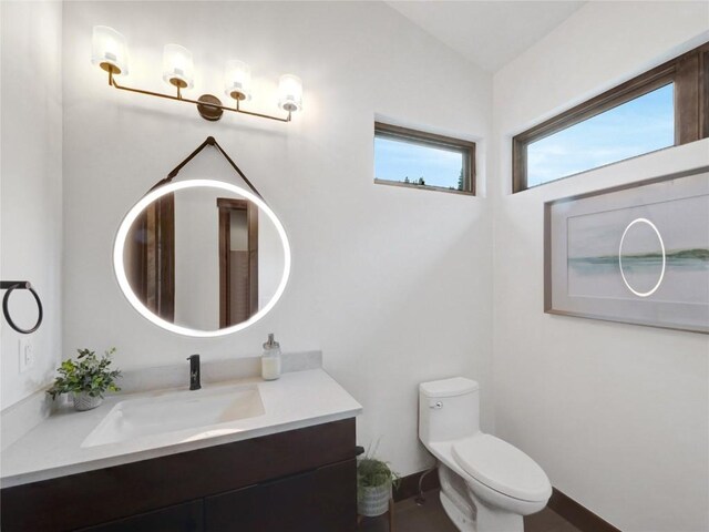 304 Raven Golf Ln, Silverthorne, CO 80498 - bathroom featuring vanity and toilet