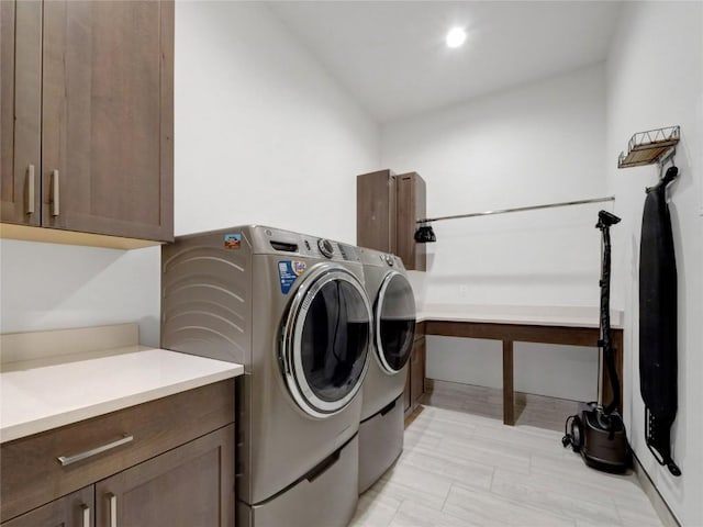 304 Raven Golf Ln, Silverthorne, CO 80498 - laundry room featuring cabinet space and independent washer and dryer