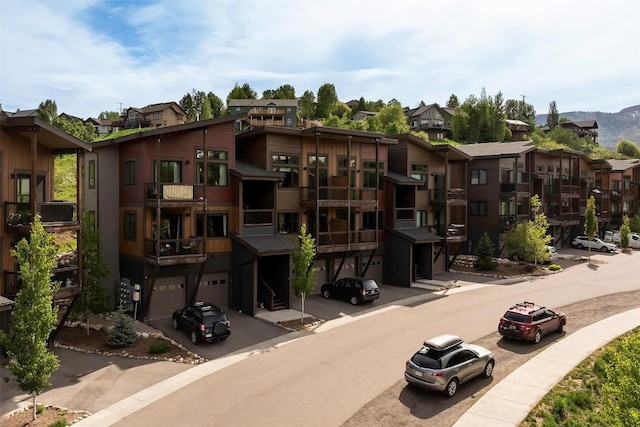 320 Fox Springs Cir Unit 302, Steamboat Springs, CO 80487 - view of building exterior featuring an attached garage