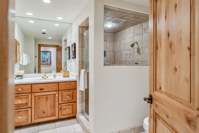 731 Lakeview Cir, Silverthorne, CO 80498 - bathroom with a shower stall, recessed lighting, toilet, vanity, and tile patterned floors