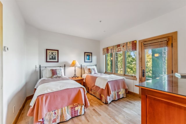 731 Lakeview Cir, Silverthorne, CO 80498 - bedroom with light wood finished floors and baseboards