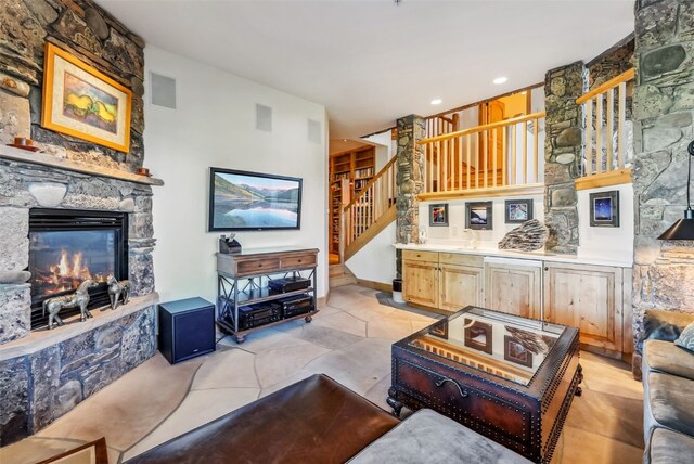 731 Lakeview Cir, Silverthorne, CO 80498 - living room with stairs and a stone fireplace