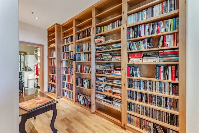 731 Lakeview Cir, Silverthorne, CO 80498 - living area featuring wall of books and wood finished floors