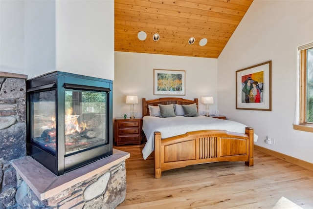 731 Lakeview Cir, Silverthorne, CO 80498 - bedroom with high vaulted ceiling, light wood-type flooring, wood ceiling, and baseboards