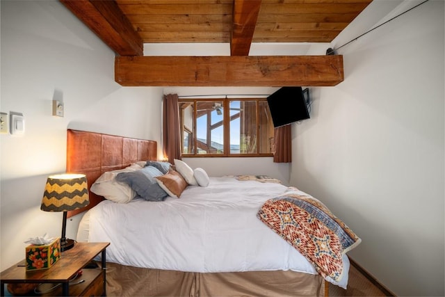31500 Runaway Pl Unit 405, Steamboat Springs, CO 80487 - carpeted bedroom with wood ceiling and beamed ceiling