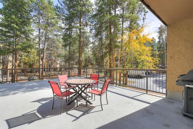 720 Columbine Rd Unit 104, Breckenridge, CO 80424 - view of patio with outdoor dining space