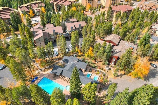 720 Columbine Rd Unit 104, Breckenridge, CO 80424 - aerial overview of property's location with a pool and nearby suburban area