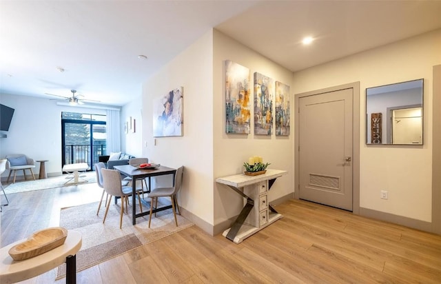 75 W 4th St Unit 206, Silverthorne, CO 80497 - corridor with light wood-style flooring and baseboards