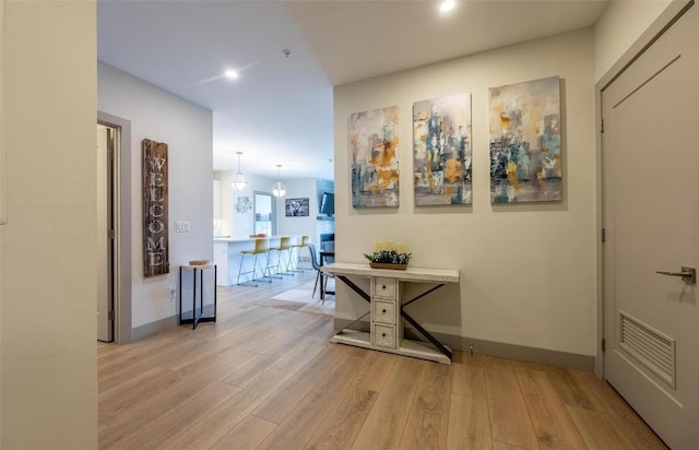 75 W 4th St Unit 206, Silverthorne, CO 80497 - corridor with wood finished floors, recessed lighting, and baseboards