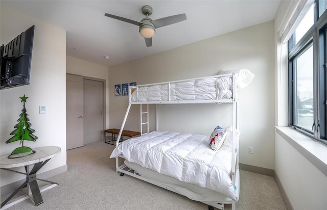 75 W 4th St Unit 206, Silverthorne, CO 80497 - carpeted bedroom featuring a ceiling fan and baseboards