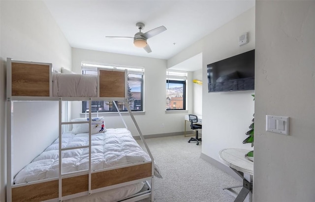 75 W 4th St Unit 206, Silverthorne, CO 80497 - bedroom with light carpet, multiple windows, baseboards, and an office area