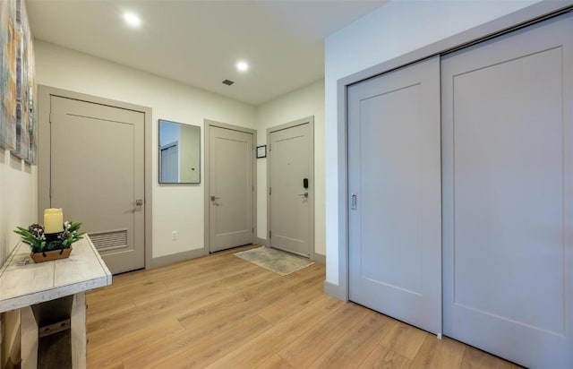 75 W 4th St Unit 206, Silverthorne, CO 80497 - entryway with light wood finished floors and recessed lighting