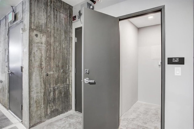75 W 4th St Unit 206, Silverthorne, CO 80497 - corridor featuring elevator and concrete flooring