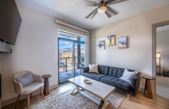 75 W 4th St Unit 206, Silverthorne, CO 80497 - living room with ceiling fan and light wood-style floors