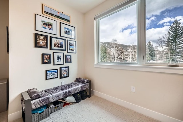 sitting room featuring baseboards