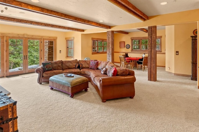 carpeted living area with recessed lighting, baseboards, french doors, and beamed ceiling