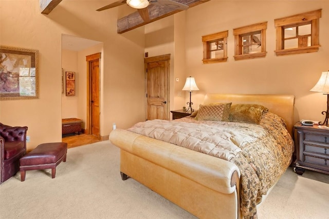 carpeted bedroom with a ceiling fan