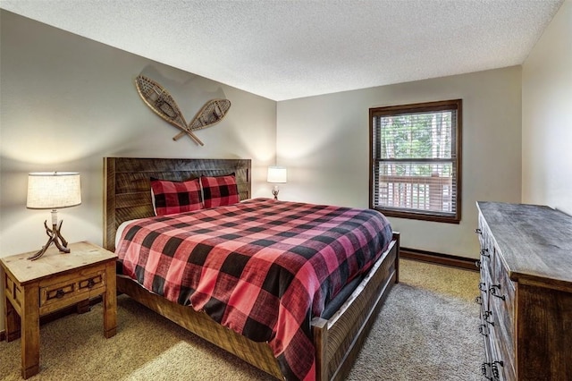 840 Four Oclock Rd Unit A1D, Breckenridge, CO 80424 - carpeted bedroom featuring a textured ceiling