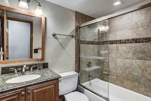 840 Four Oclock Rd Unit A1D, Breckenridge, CO 80424 - bathroom featuring a textured wall, vanity, and enclosed tub / shower combo