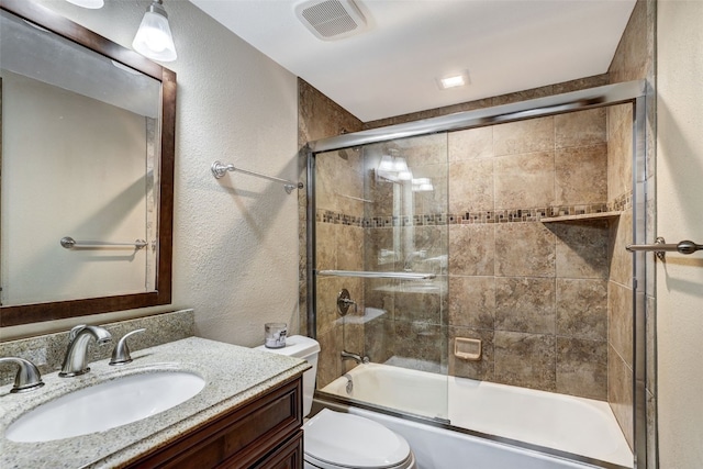 840 Four Oclock Rd Unit A1D, Breckenridge, CO 80424 - bathroom featuring vanity, shower / bath combination with glass door, and a textured wall